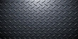 © DreamPixel Art - Seamless industrial dark metal texture background with a diamond pattern on a grey steel plate surface for grunge metallic wallpaper design