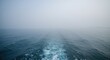 © vxnaghiyev - Tranquil sea panorama with visible boat wake patterns