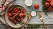 © vxnaghiyev - Grilled mini sausages with tomato and rosemary served with sauce and creamy mayonnaise flat lay