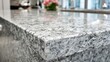 © Hafaiz - Polished Grey Granite Countertop Surface with Speckled Natural Pattern