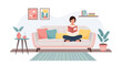 © Yuliana - Woman reading a book on a comfortable sofa.