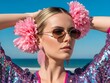 © DA Dermawan - A stylish young woman with pink flowers in her hair and sunglasses poses at the beach, radiating a vibrant and joyful summer mood.