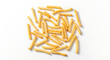 © Farida - A pile of golden French fries on a white background