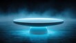 © andrina - Illuminated circular platform rests upon a textured surface surrounded by atmospheric haze