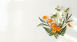 © Gambar - orange flowers and green leaves on white background