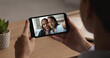 © fizkes - Female hold smartphone, kid and mom displayed on device screen, making selfie, engage in videoconference call use application. Social media platform user, videocall between relatives people, close up