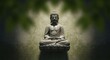 © ZHMPRO - Stone buddha statue in meditation pose on a lotus pedestal against a textured background with soft foliage framing