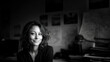 © overrust - black and white portrait of smiling female entrepreneur at office desk, candid everyday businesswoman portrait in soft light