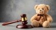 © Stocker Girl - Child custody law concept with wooden judge gavel and teddy bear, family court legal proceedings, divorce and guardianship rights