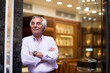 © .shock - Middle Eastern man in jewelry store during wedding ring shopping with family and friends