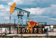 © Zsolt Biczó - Oil pumpjack in industrial field