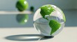 © The Little Hut - Crystal Earth Globe with Green Continents Reflecting Light, Symbolizing Global Ecology and Sustainability