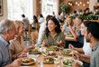 © Meow Creations - Cheerful young woman enjoying a healthy meal and conversation with friends at a cafe
