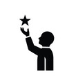 © Fera - Silhouette of a person reaching for a star.