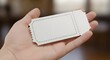 © David - Hand Holding a Blank Paper Ticket Template for Events Shows and Cinema Admissions