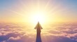© IMAMSAFII - Jesus Christ statue stands above clouds at sunrise with outstretched arms