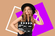 © Pixel-Shot - Beautiful actress with movie clapper on beige background