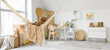 © Pixel-Shot - Hammock with toy bear and plaid hanging in children's room interior