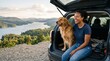 © Таня Андреева - Happy Black woman and her golden retriever sitting in car trunk at scenic lake overlook