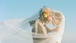 © mocography - 青空の下で花束を抱え微笑む日本人カップルのウェディングフォト