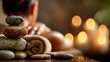 © Anatoll Paveel - Woman enjoying exotic hot stone spa massage on blurred background.