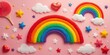 © Creative Art - Handcrafted clay rainbows, colorful stars, hearts and clouds on pink. Spring 2026 cheerful flatlay — ideal for kids, party, celebration, greeting card and seasonal design.