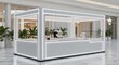 © SRI REJEKI - Modern Retail Kiosk Design - Sleek, Illuminated Structure in a Bright Mall Environment.