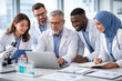 © Khemmanat - Scientific Collaboration: A diverse group of scientists in lab coats collaborates around a laptop, focused on a project in a bright, modern laboratory setting.