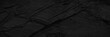 © Наталья Босяк - Black white dark gray rock stone granite texture background. Mountain surface. Close-up. Grunge rough solid hard. Design. Wide banner. Panoramic.