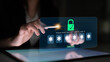 © InfiniteFlow - Woman using touchscreen device to enter OTP code for secure sign-in process, showcasing modern technology and digital security measures in action Sigmoid