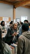 © Yuliia - Diverse group of people browsing books at community center book fair with wooden beams and community matters bulletin board in background.