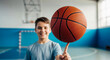 © Alex - Boy spinning basketball on finger symbolizing sport skill