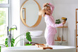 © Pixel-Shot - Pretty young woman drying hair in bathroom