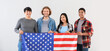 © Pixel-Shot - Group of students with USA flag on light background