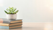© MP-AI - Succulent plant stack book tabletop copy space brainstorming workspace minimalist still life with potted succulent book stack wooden tabletop
