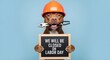 © MDAzizul - A brown pit bull dog wearing a construction hard hat holding a pair of pliers in its mouth and a chalkboard sign that says we will be closed on labor day