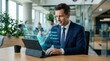 © Sukon - A businessman uses a laptop to manage digital paperwork and efficient workflow management.