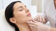 © Eve - Close up of beautiful woman receiving hyaluronic acid injection in chin. Professional aesthetic surgeon performing filler procedure. Cosmetic dermatology and anti-wrinkle treatment.