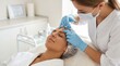 © Eve - Professional cosmetologist injecting botox or dermal filler in young woman forehead. Anti-aging beauty treatment, facial rejuvenation and aesthetic medicine in cosmetic clinic.