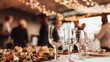 © Nart - Upscale cocktail reception with gourmet finger foods and empty wine glasses in sharp focus. Warm ambient lighting and soft bokeh enhance this luxury event scene.