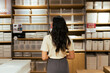 © PaeGAG - Woman shopping seeing home organization storage solution products