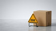 © Chopang.studio - Cardboard box issue sign warning sign caution sign package delivery box Cardboard box with issue warning sign metal stand near package gray floor, shipment problem concept with copy space