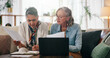 © peopleimages.com - Lesbian couple, old women and laptop in home with documents, retirement or investment planning. LGBTQ people, relationship and budget review with paperwork, meeting and savings for financial security