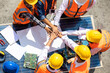 © NVB Stocker - Ethnic diversity worker people, Success teamwork. Group of professional engineering people wearing hardhat safety helmet meeting with solar photovoltaic panels discussion in new project