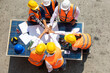 © NVB Stocker - Ethnic diversity worker people, Success teamwork. Group of professional engineering people wearing hardhat safety helmet meeting with solar photovoltaic panels discussion in new project