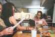 © peopleimages.com - Documents, investor and women in meeting, planning for investment strategy and economy info. Employees, people and financial advisor in office, report for trading opportunity and profit increase
