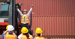 © NVB Stocker - Strike of workers in container yard. Group of multiethnic engineer people during a protest in workplace