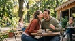 © BloomPix - Happy Couple Kissing at Outdoor Cafe on a Sunny Day