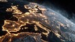 © karmila - Close-up of glowing Earth at night showing interconnected city lights over Europe
