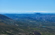 © Taras Grebinets - Aerial View of Olive Valley and Snowy Mountains Over Rolling Spanish Countryside
